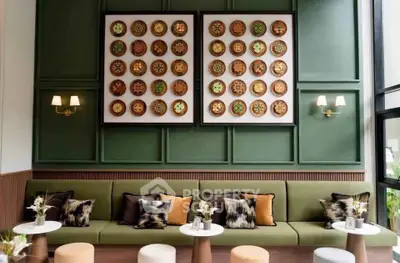 Stylish modern living room with unique wall art and cozy seating area