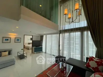 Spacious modern living room with high ceilings and large windows in a luxury apartment.