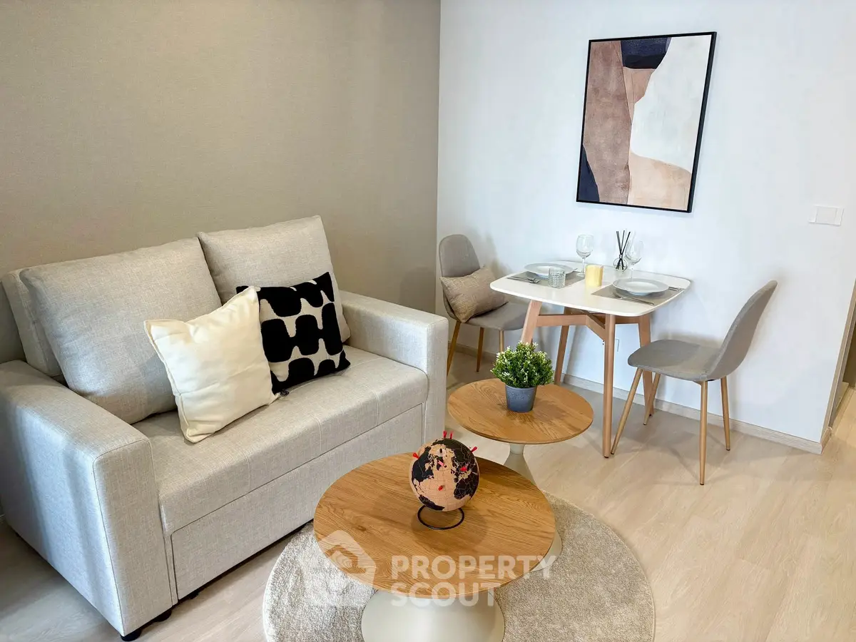 Modern living room with stylish decor and cozy dining area