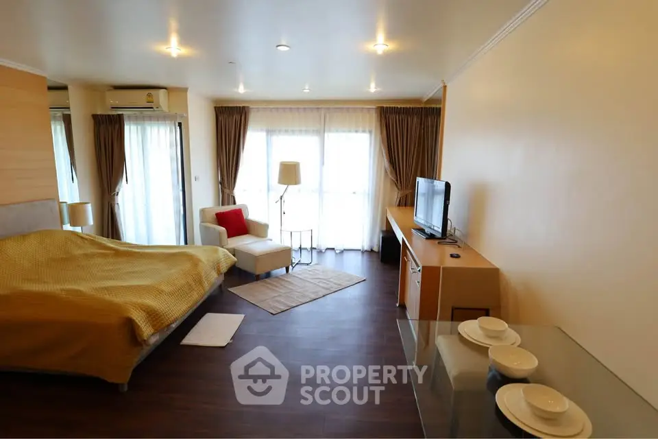 Spacious modern living room with cozy seating and natural light