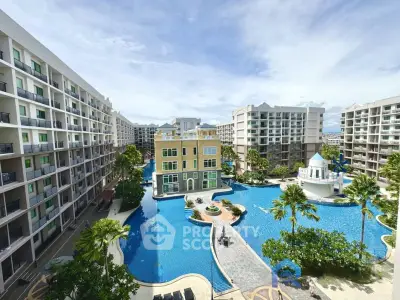 Luxurious resort-style condominium with expansive pool and lush landscaping.