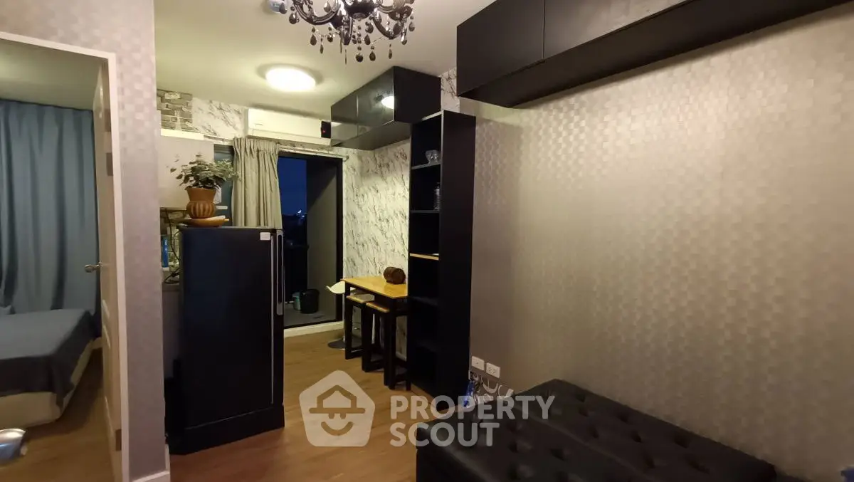 Modern apartment interior with stylish decor and balcony access