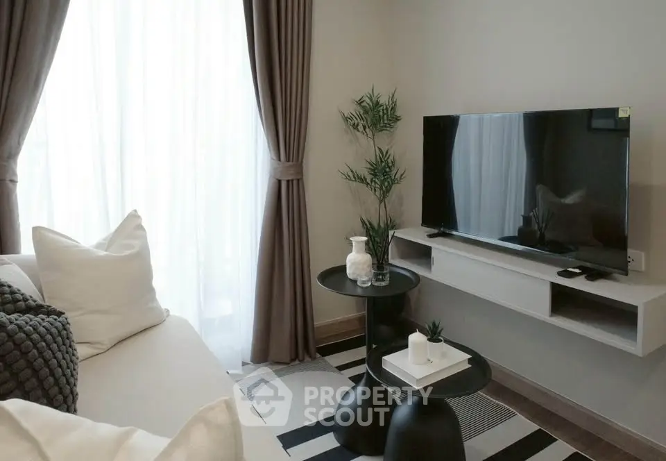 Modern living room with sleek TV setup and stylish decor