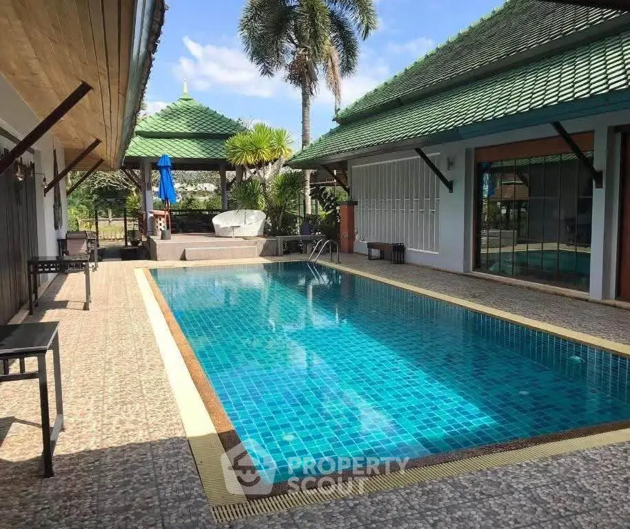 Luxurious villa with private pool and tropical garden view