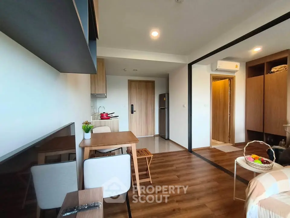 Modern studio apartment with open layout and stylish furnishings