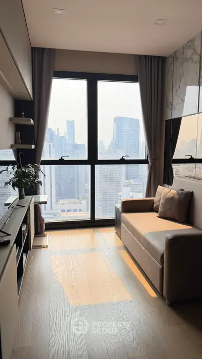 Modern living room with large windows offering stunning city skyline view, cozy sofa, and stylish decor.