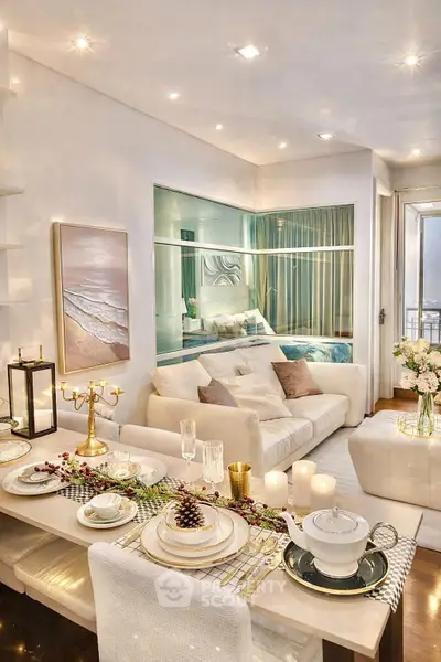 Luxurious open-plan living room with elegant dining setup and cozy seating area, perfect for modern urban living.
