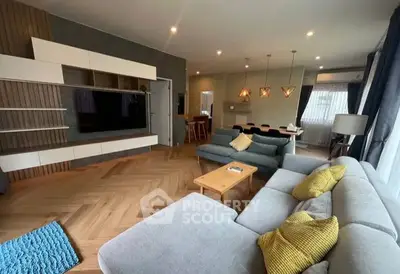 Spacious living room with modern decor and large sectional sofa
