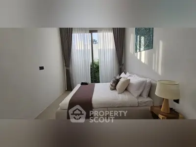 Cozy bedroom with elegant decor and natural light