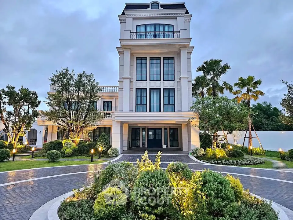 Luxurious modern mansion with elegant facade and lush landscaped garden