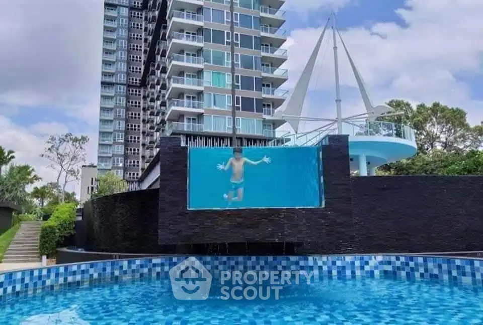 Modern high-rise building with unique pool and stunning architecture