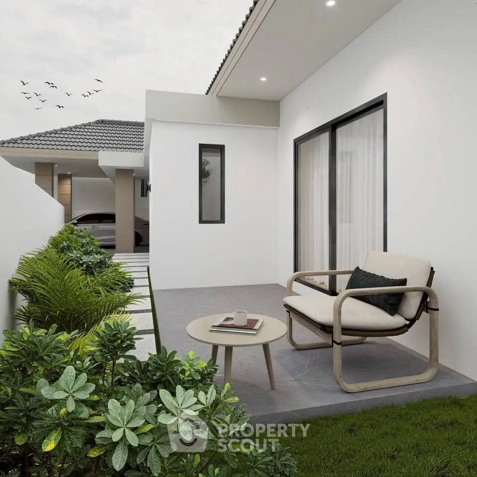 Charming modern patio with cozy seating and lush greenery, perfect for relaxation and outdoor enjoyment.