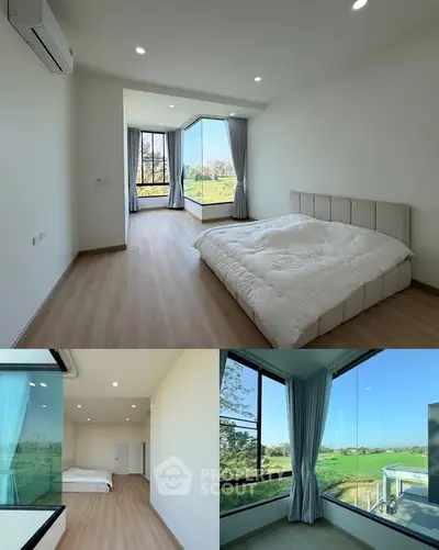 Spacious bedroom with large windows offering stunning views of lush greenery, featuring modern minimalist design.