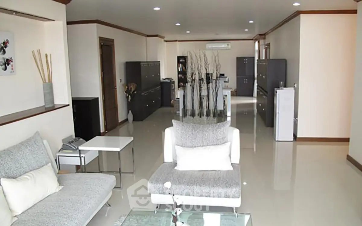 Spacious modern living room with sleek furniture and elegant decor