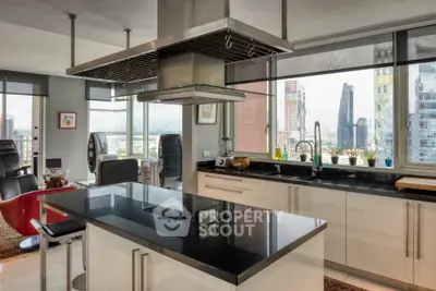 Luxurious modern kitchen with city skyline view, featuring sleek black countertops and high-end appliances.