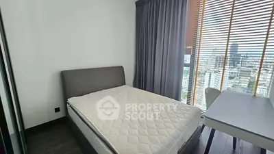 Modern bedroom with city view and stylish furnishings