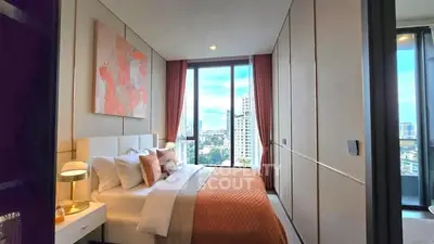 Luxurious bedroom with stunning city view and modern decor