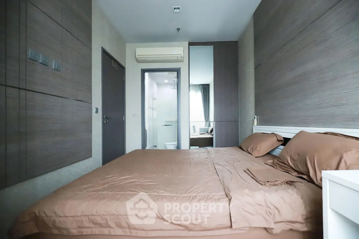Modern bedroom with ensuite bathroom and stylish decor