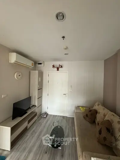 Cozy living room with modern furniture and air conditioning