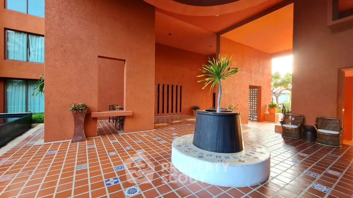 Stunning terracotta building entrance with stylish decor and vibrant tiles