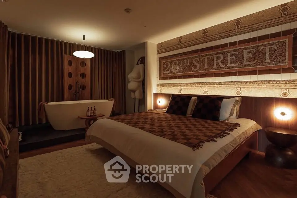 Luxurious bedroom with unique decor and freestanding bathtub, perfect for relaxation.