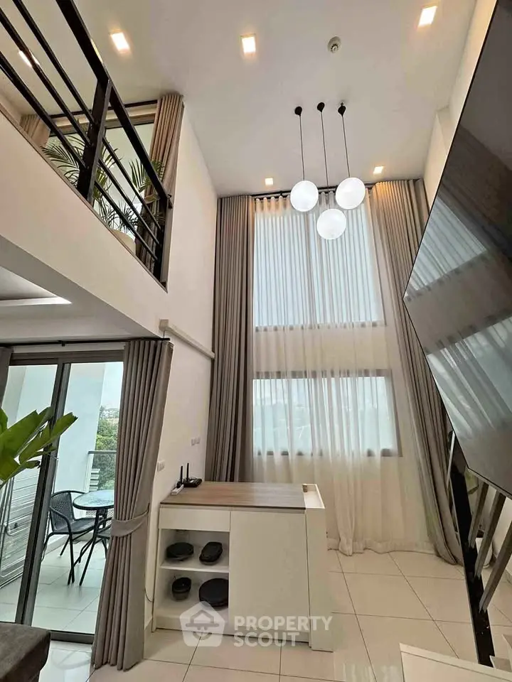 Stunning modern living room with high ceilings and elegant decor