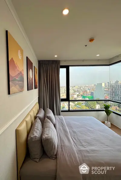 Modern bedroom with panoramic city view and stylish decor