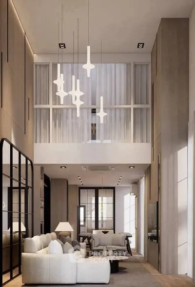 Luxurious modern living room with high ceilings and elegant lighting fixtures