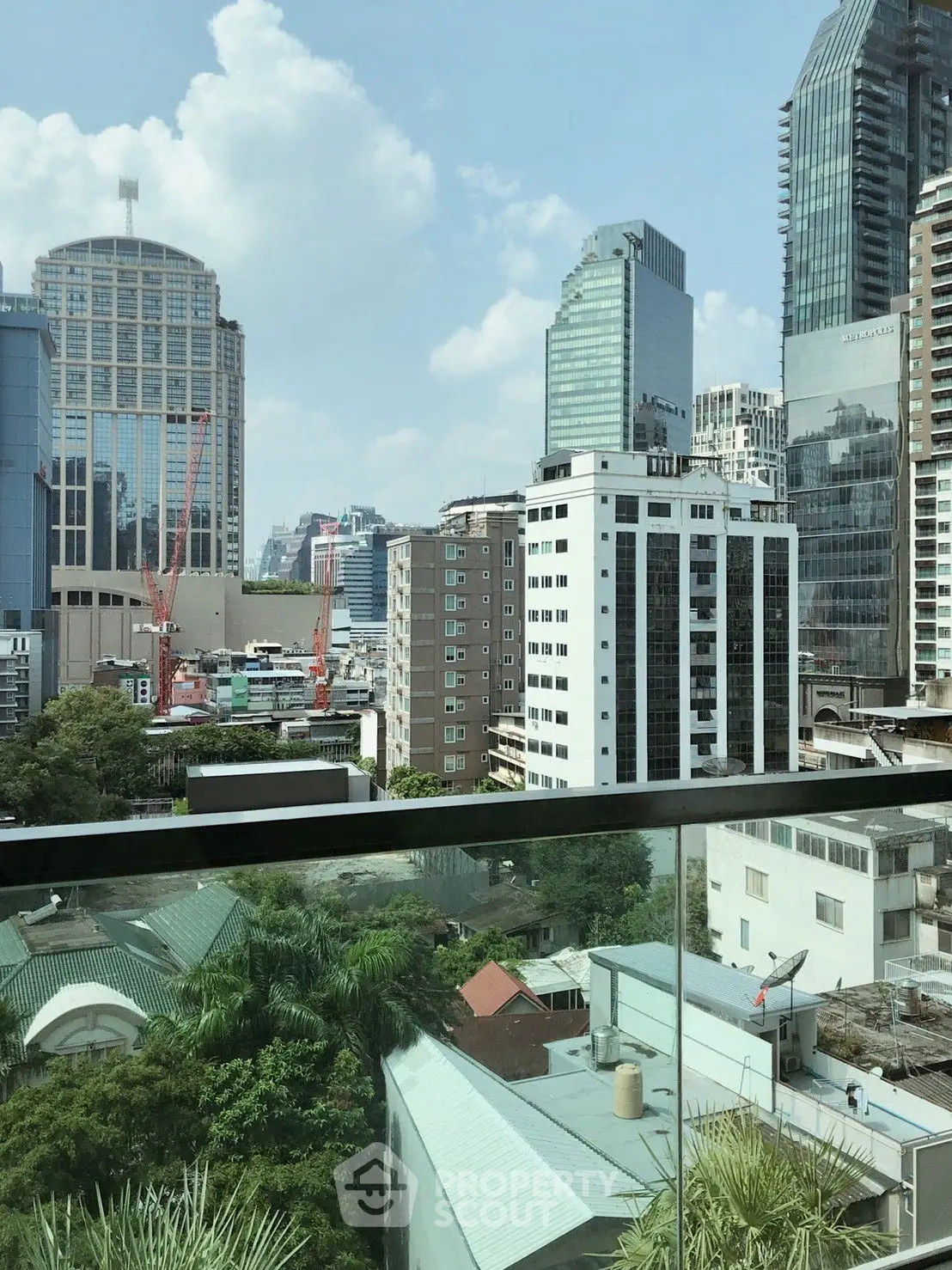 Futuristic skyscraper skyline with modern architecture and lush greenery