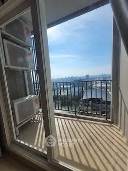 Stunning balcony view with city skyline and serene water scenery.