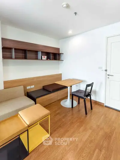 Modern living room with stylish furniture and wooden flooring