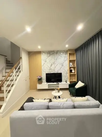 Modern living room with stylish decor and cozy seating area