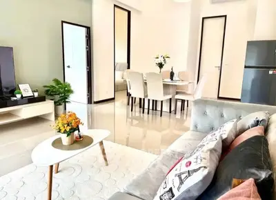 Spacious modern living room with elegant dining area and stylish decor