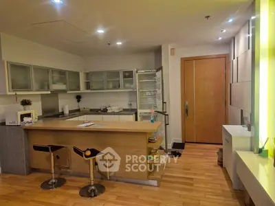 Modern kitchen with open layout and stylish breakfast bar seating