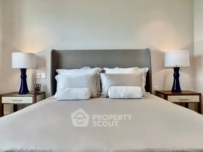 Luxurious bedroom with elegant decor and plush bedding for ultimate comfort.