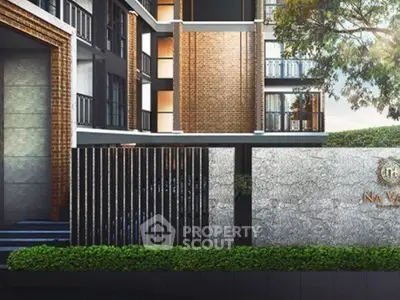 Modern apartment building exterior with stylish brick and metal design