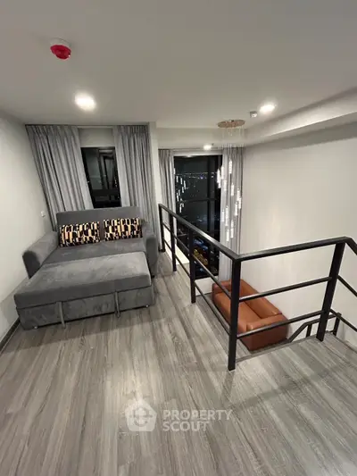 Modern loft-style living area with sleek design and city view