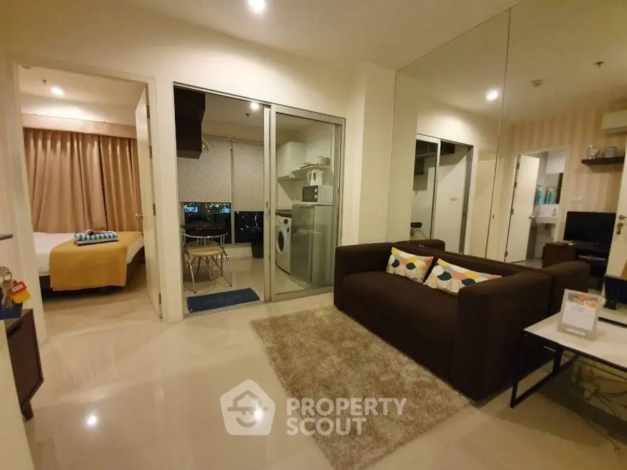 Modern apartment with cozy living room and open kitchen layout