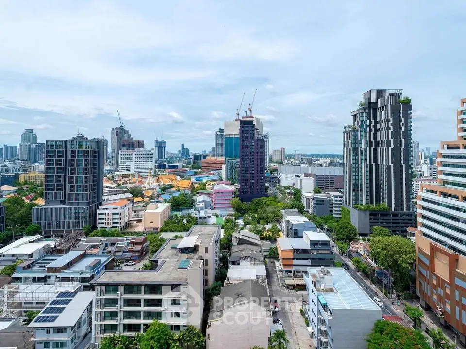 Stunning cityscape view showcasing modern high-rise buildings and lush greenery, perfect for urban living enthusiasts.