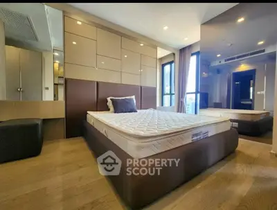 Luxurious modern bedroom with elegant design and ample natural light