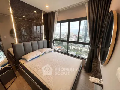 Luxurious bedroom with stunning city view and modern decor
