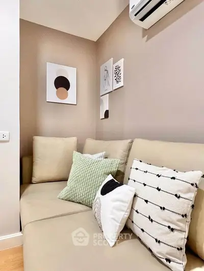 Cozy living room with modern decor and comfortable seating, perfect for relaxation.