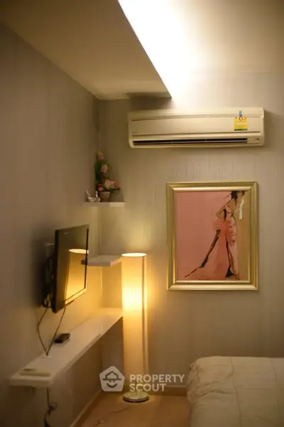 Cozy bedroom with modern decor and air conditioning