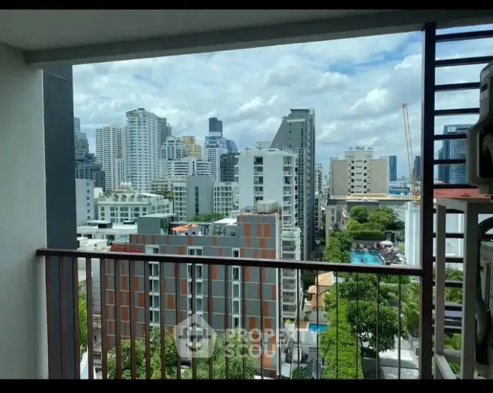 Stunning cityscape view from a high-rise balcony, perfect for urban living enthusiasts.