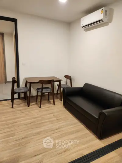 Cozy living room with modern furniture and air conditioning