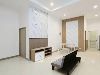Modern living room with minimalist design and elegant marble accents