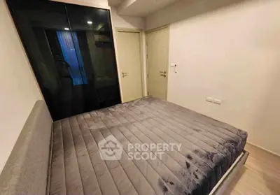 Cozy bedroom with modern design and ample storage space