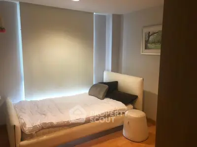 Cozy bedroom with modern decor and natural light