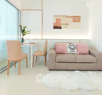 Chic modern living room with cozy sofa, stylish decor, and elegant dining area.