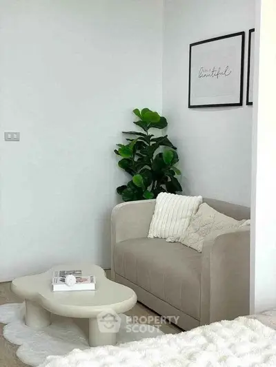 Cozy living room with modern beige sofa and stylish decor